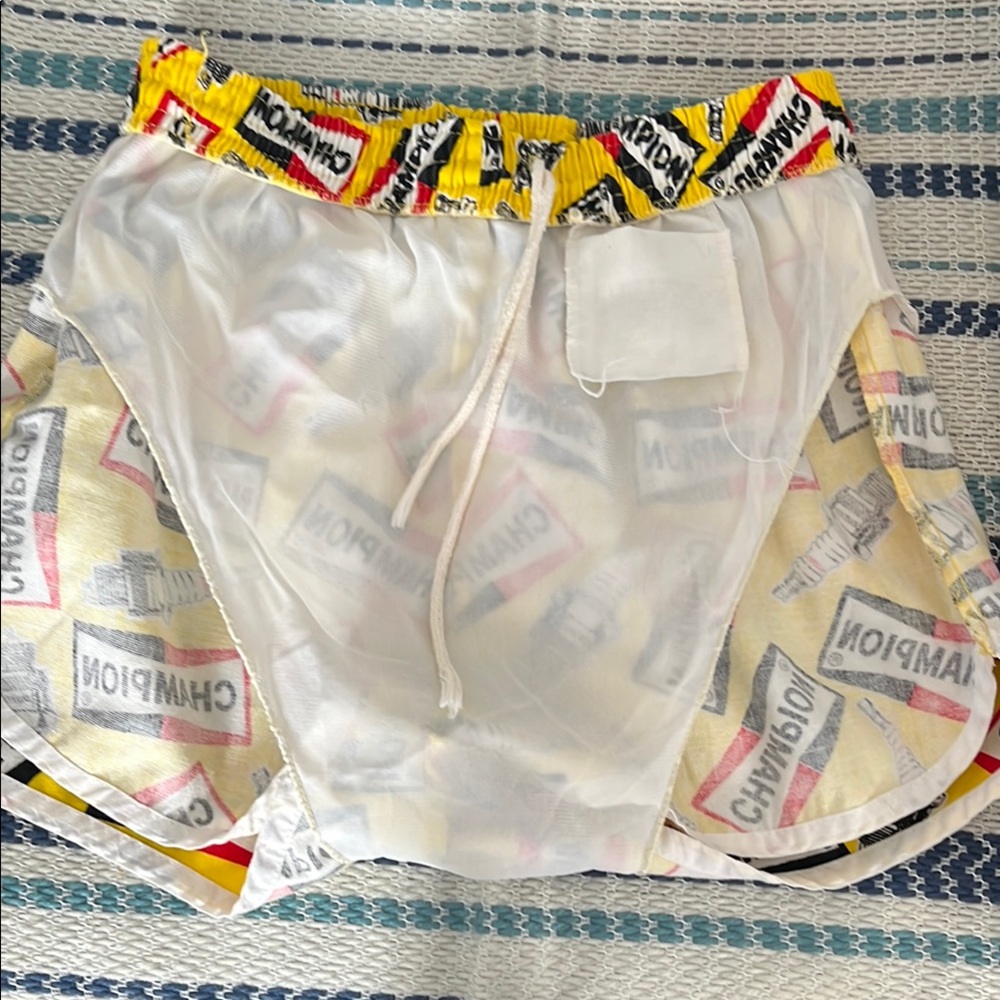 Vintage Champion L spark plug Yellow and Red swim trunks rare Novelty - Picture 8 of 12